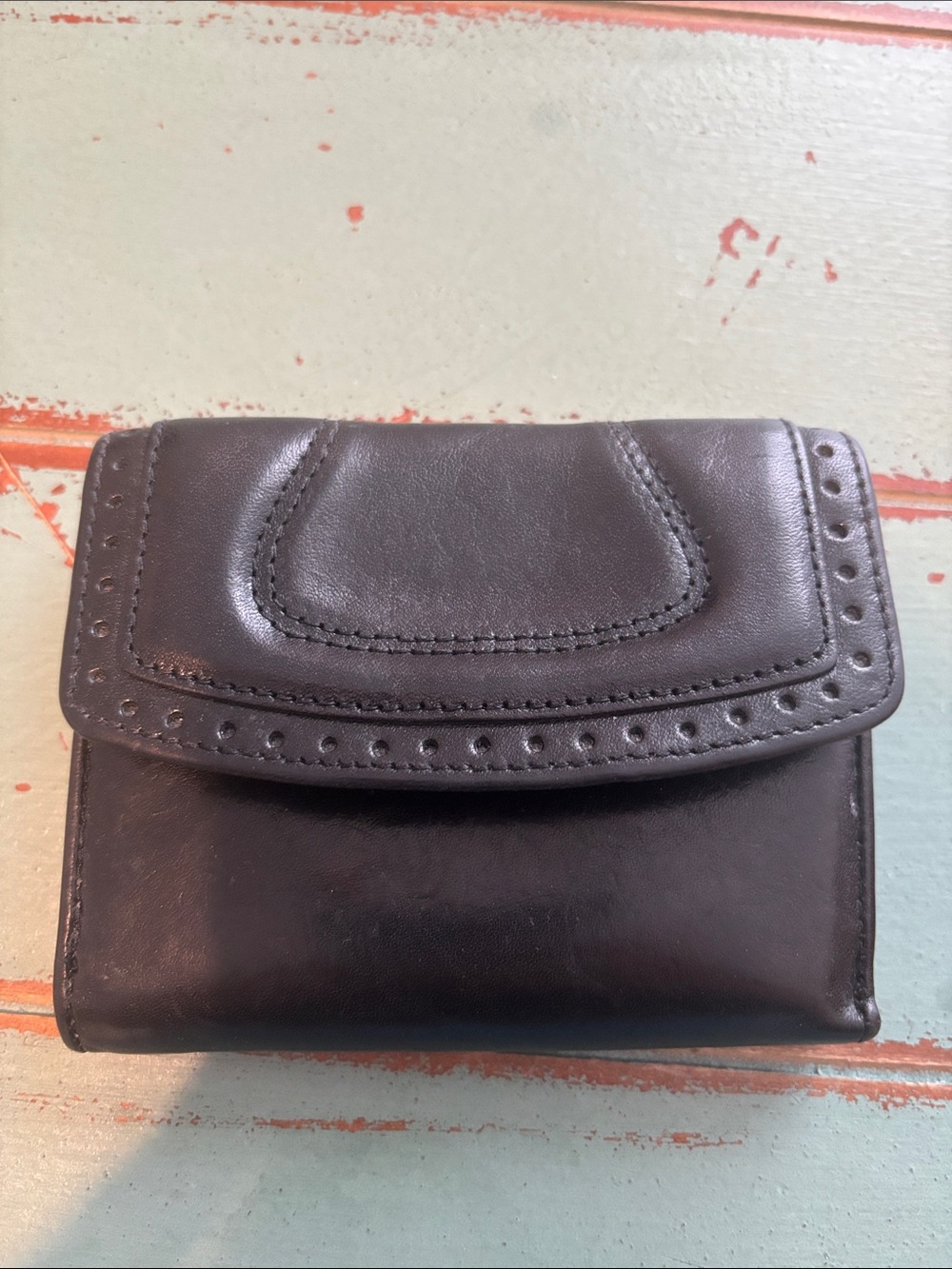 Brahmin Black Fold-Over Wallet with Perforated Trim